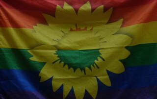 Pride Flagge mit Sonnenblume der Grünen